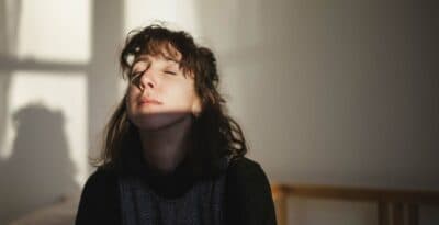 Young Jewish woman experiencing peace.