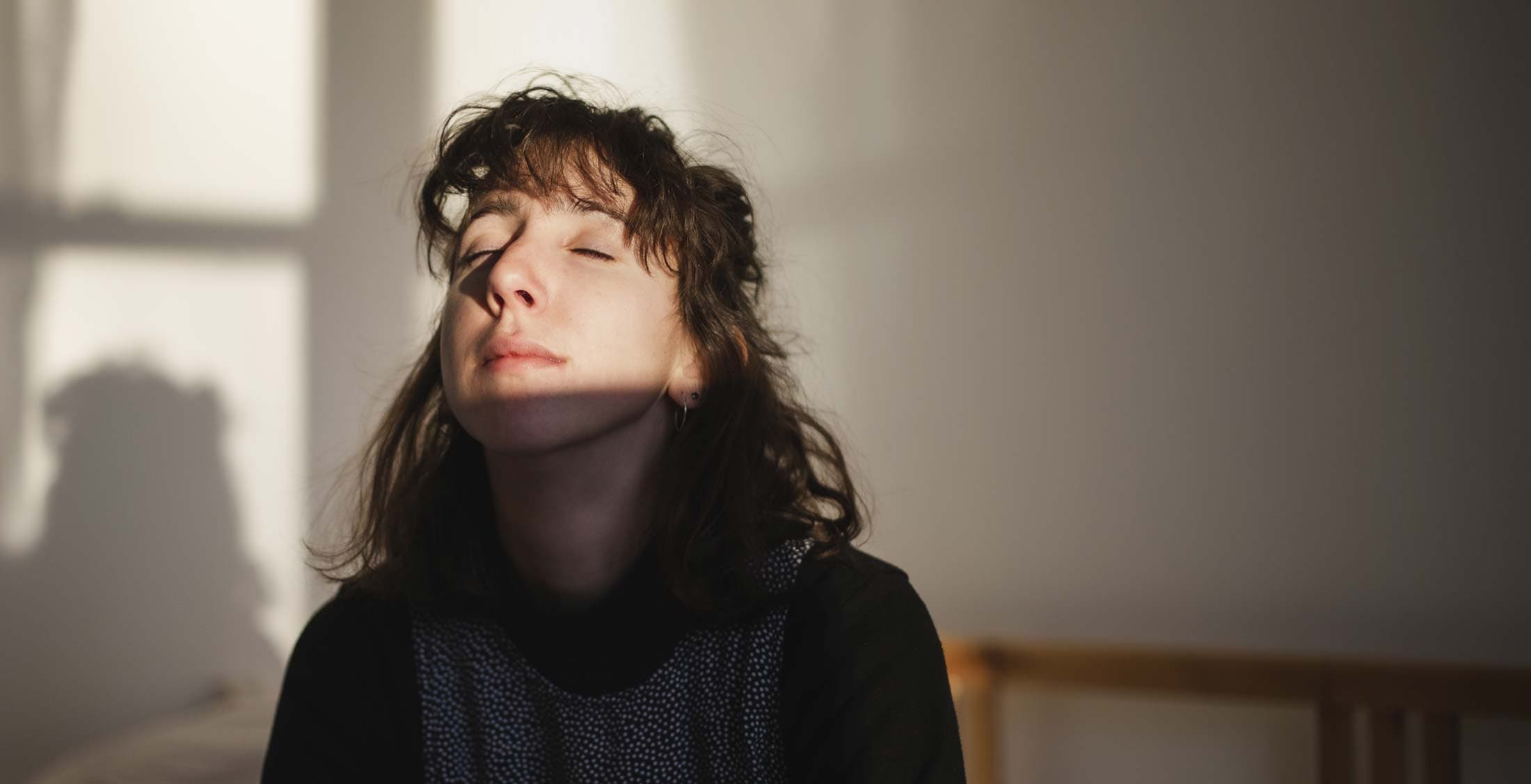 Young Jewish woman experiencing peace.