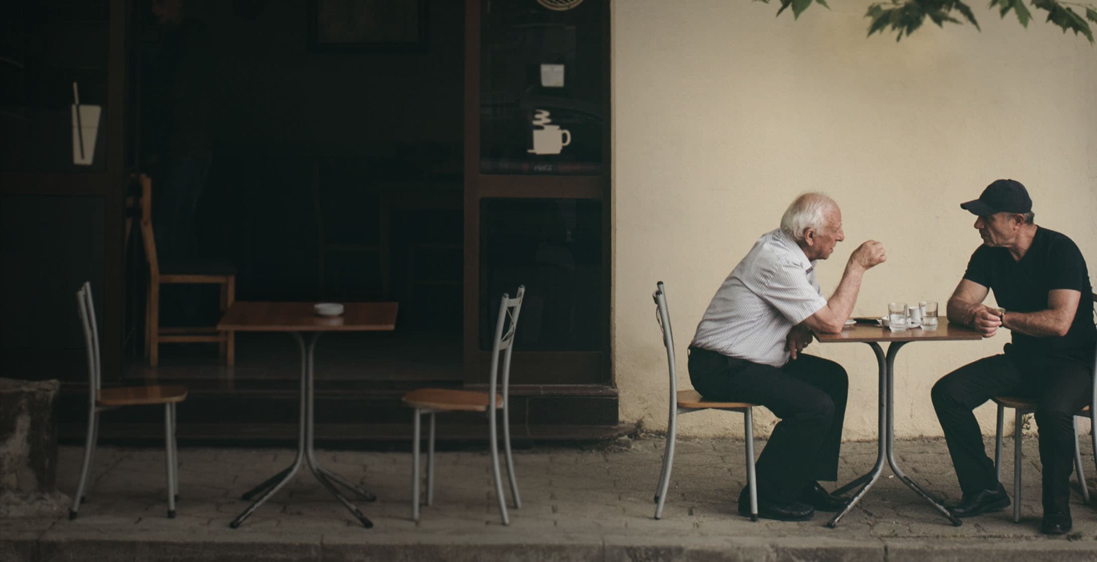 Two men talking